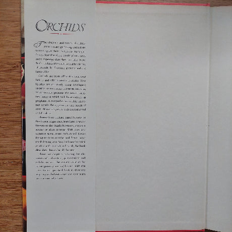 Book with text on a wooden surface